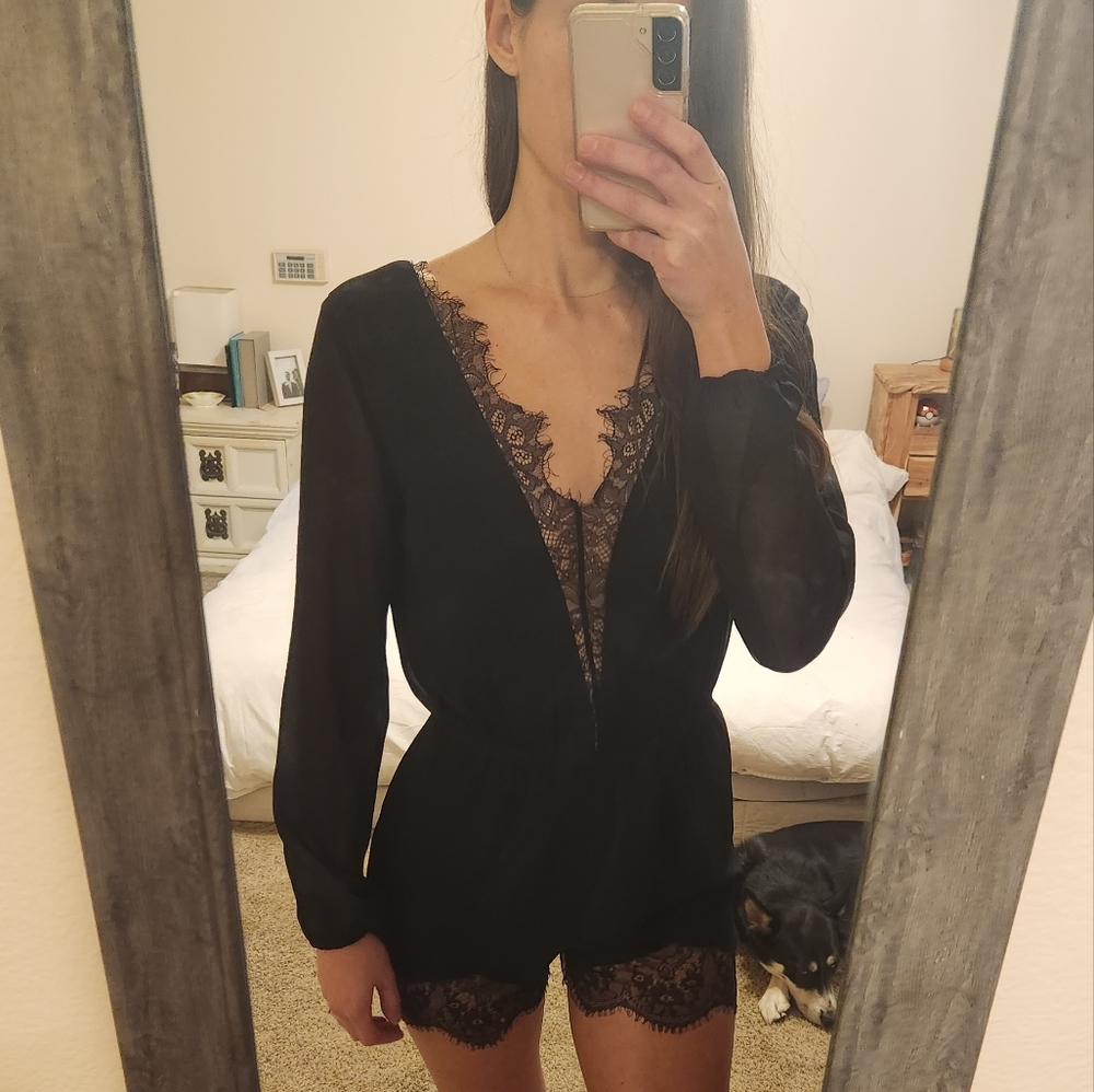 Black romper with lace trim